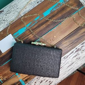 Black small woven clutch bag